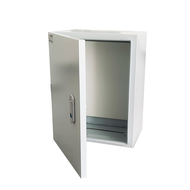 Open empty gray metal electrical enclosure cabinet with hinged door on white background