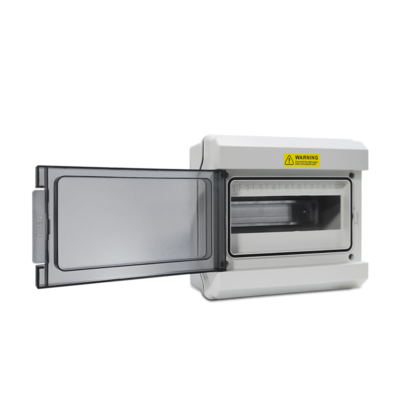 Open wall mounted electrical enclosure with clear viewing window and safety label