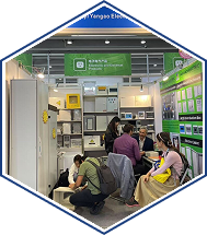 Team troubleshooting equipment during trade show booth setup at expo display stand